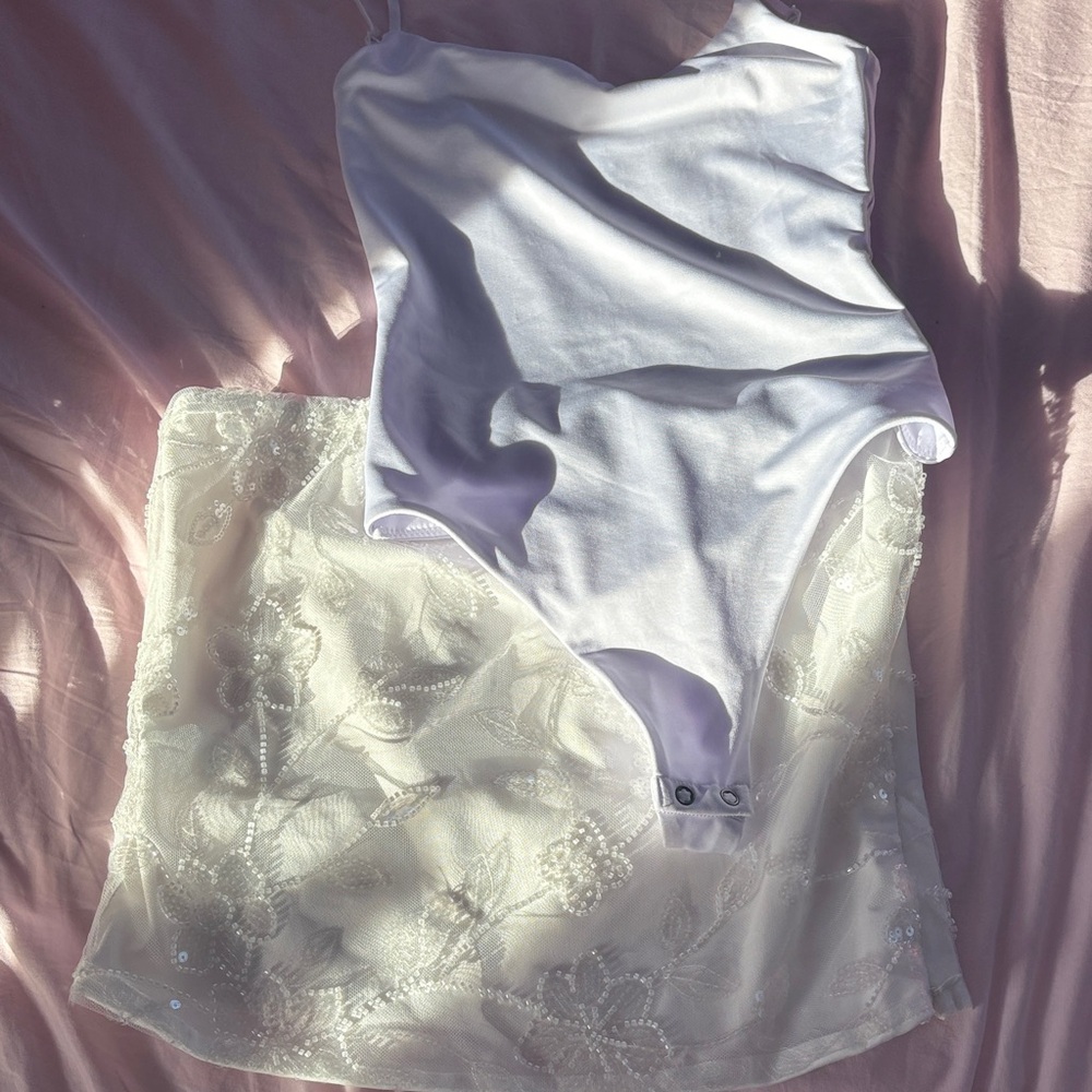 White elegant body suit size xs and skirt size medium both from hazel boutique